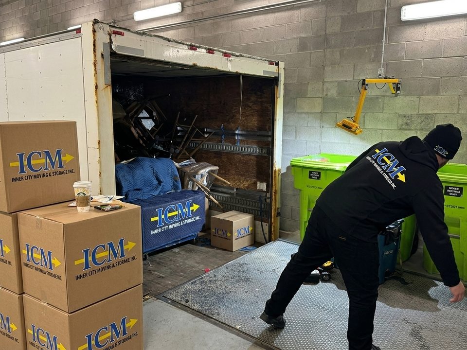 Cheap Movers Burlington — Inner City Moving crew wrapping and loading for a Burlington move