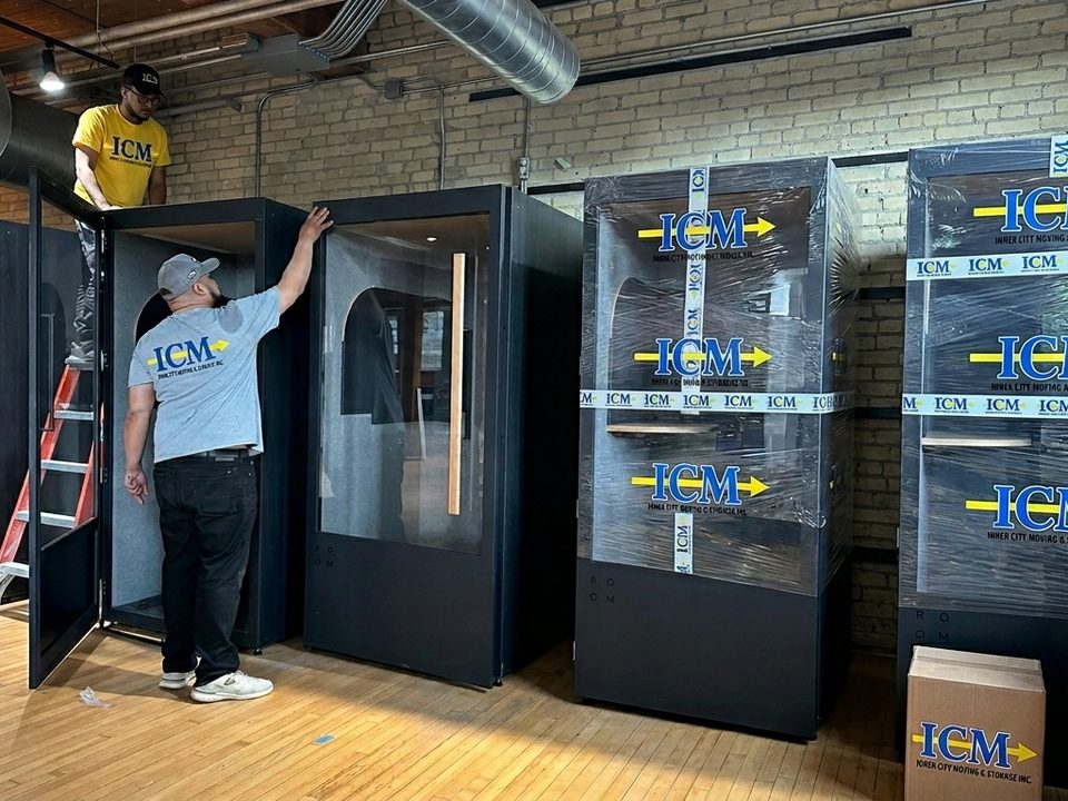 Storage Services Milton — Inner City Moving crew wrapping and loading for a Milton move